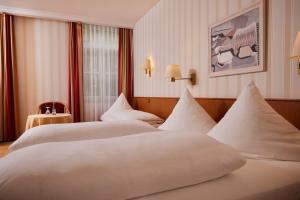 Postel nebo postele na pokoji v ubytování Hotel Zum Schiff