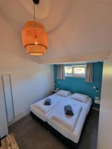 Postel nebo postele na pokoji v ubytování BeachWay
