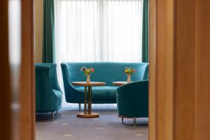 Posezení v ubytování Hotel Zum Schiff
