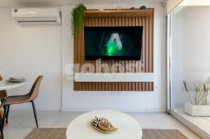 TV a/nebo společenská místnost v ubytování New-exclusive 2-bedroom Apt In Molas Lpez Area