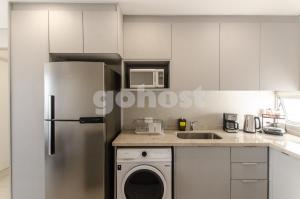 Kuchyň nebo kuchyňský kout v ubytování New-exclusive 2-bedroom Apt In Molas Lpez Area