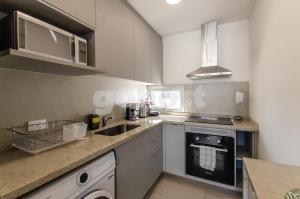 Kuchyň nebo kuchyňský kout v ubytování New-exclusive 2-bedroom Apt In Molas Lpez Area