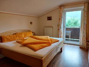 Postel nebo postele na pokoji v ubytování Appartements am See