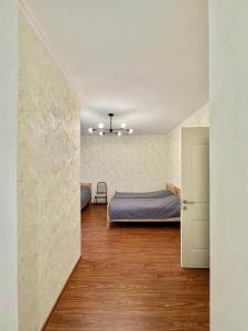 Letto o letti in una camera di Evergreen Surami Hotel