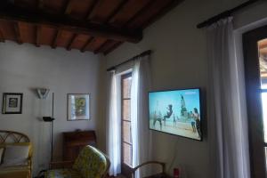 TV a/nebo společenská místnost v ubytování CASA LIMONE
