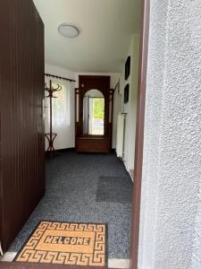 Una cama o camas en una habitación de Apartmán Pod Sjezdovkou