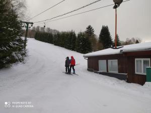 Apartmán Pod Sjezdovkou durante el invierno