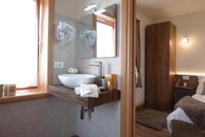 Postel nebo postele na pokoji v ubytování Albergo Trattoria Speranza