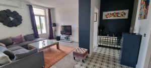 Posedenie v ubytovaní SUPERBE MAISON 6 ch, 4 sdb, terrasses et billard