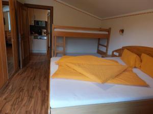 Postel nebo postele na pokoji v ubytování Appartements am See
