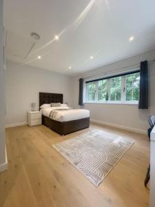 En eller flere senge i et værelse på The Gatehouse