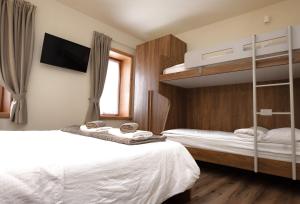 Postel nebo postele na pokoji v ubytování Albergo Trattoria Speranza