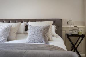 A bed or beds in a room at Norton Grounds 