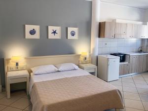 Ένα ή περισσότερα κρεβάτια σε δωμάτιο στο Platanias Memories Studio 5