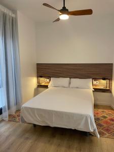 Posteľ alebo postele v izbe v ubytovaní Precioso apartamento en Málaga Centro