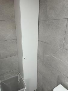 a bathroom with a sink and a toilet in it at New modern apartment, Scandinavian style, ocean view, huge terrace in Icod de los Vinos +22 photos