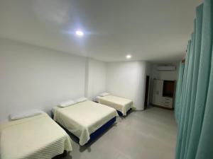 Voodi või voodid majutusasutuse Penguin House toas