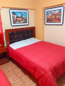 Postel nebo postele na pokoji v ubytování Hostal kuntur cusco