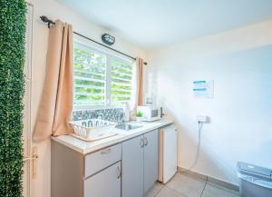 Kupatilo u objektu Faro Escondido Pool & Jacuzzi Ocean View by BioBay