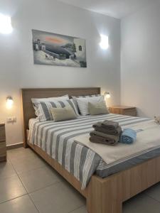 Кровать или кровати в номере Deda Apartments