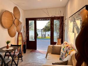 Posezení v ubytování Loft Maruê Porto de Pedras