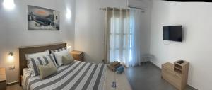 Кровать или кровати в номере Deda Apartments