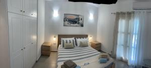 Кровать или кровати в номере Deda Apartments