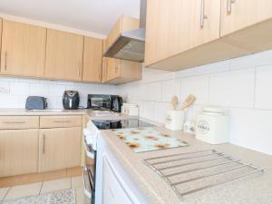 Kuchyň nebo kuchyňský kout v ubytování Tiffany's Cottage + 23 fotografií