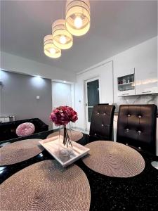 A kitchen or kitchenette at Cseppecske Apartman