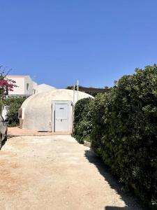 a large dome tent with a door in it at Casa Vacanze Perla Marina in Marsala