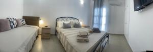 Кровать или кровати в номере Deda Apartments