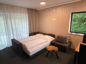 Posteľ alebo postele v izbe v ubytovaní Apartmán A29-2, Hrabovo, Ružomberok