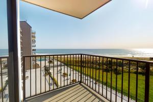a balcony with a view of the ocean at Sea Colony - 509 Dover House Rd. in Bethany Beach