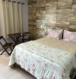 Cama o camas de una habitación en Pousada Cascata de Pedra