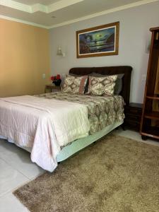 Cama o camas de una habitación en Pousada Cascata de Pedra
