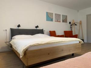 Postel nebo postele na pokoji v ubytování APARTMÁNY ŠÁRKA