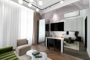 Un televizor și/sau centru de divertisment la The Amauris Vienna - Relais & Châteaux