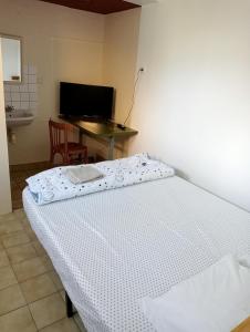 Postel nebo postele na pokoji v ubytování Les Chambres Studios de Pleslin-Foucher