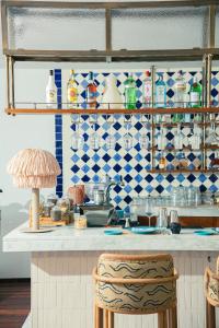 a kitchen with a blue and white tiled wall at Four Seasons Hotel Tunis in Gammarth