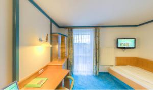 Posteľ alebo postele v izbe v ubytovaní 1A Landhotel Schicklberg