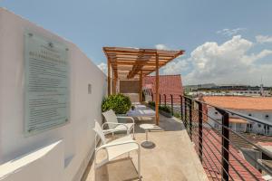 Rõdu või terrass majutusasutuses Hotel Boutique Bovedas de Santa Clara By Accor