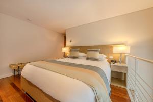 Voodi või voodid majutusasutuse Hotel Boutique Bovedas de Santa Clara By Accor toas