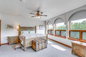 a bedroom with a bed and a ceiling fan at Expansive Edwards Condo on Main Street with Views! in Edwards