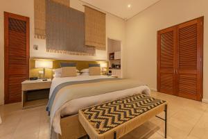 Voodi või voodid majutusasutuse Hotel Boutique Bovedas de Santa Clara By Accor toas
