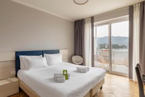 Кровать или кровати в номере B&B Hotels Park Hotel Suisse Santa Margherita Ligure