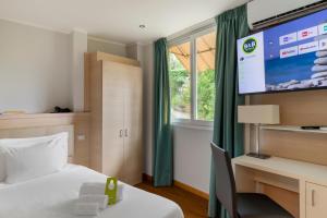 Кровать или кровати в номере B&B Hotels Park Hotel Suisse Santa Margherita Ligure