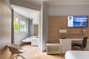Кровать или кровати в номере B&B Hotels Park Hotel Suisse Santa Margherita Ligure