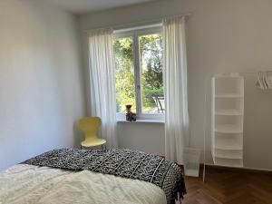 Voodi või voodid majutusasutuse Bijoux Wohnung auf dem Basler Hügel toas