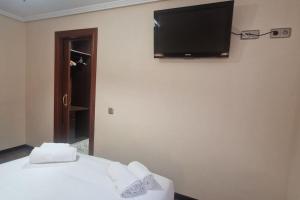 Μια τηλεόραση ή/και κέντρο ψυχαγωγίας στο 35A01 Amplio Apto 3hab en Noreña