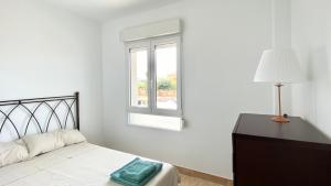 Postel nebo postele na pokoji v ubytování Disfruta de unos días en la playa ¡Y mucho más!